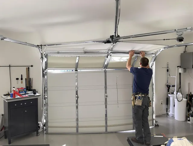 Fontana Garage Door Repair specialist performing precise section replacement on Fontana garage door