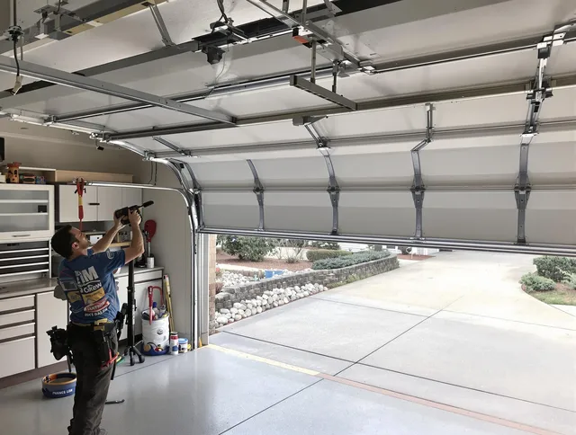 Garage door track repair service by Fontana Garage Door Repair in Fontana
